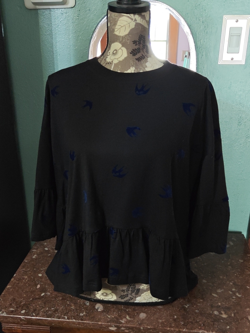 NWT MCQ Black Peplum Ruffle Long-Sleeve Top with Blue Bird Motif
